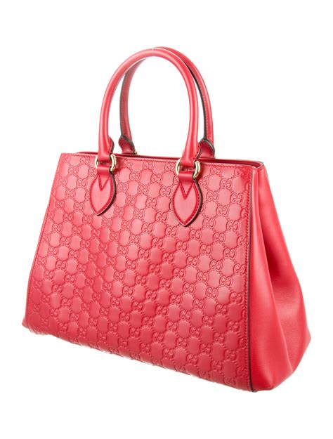 gucci signature handbag|gucci guccissima signature.